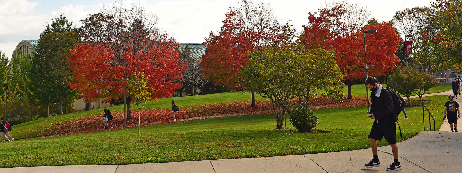 Students walking across fall campus
